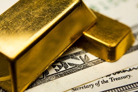 Đồng dollar mạnh buộc vàng thoái lui trong phiên Á