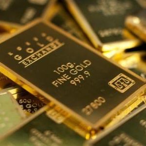 Vàng giảm giá do Fed thấy được sự lạc quan trong nền kinh tế Mỹ.