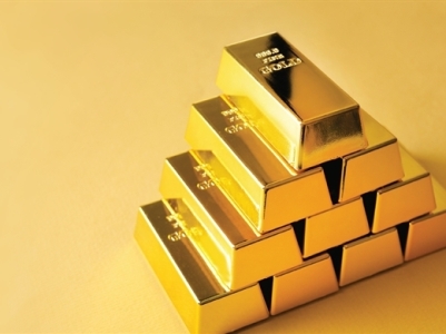 Vàng tăng khi đồng USD suy yếu sau thông tin cuộc điều tra chiến dịch tranh cử Tổng thống Mỹ