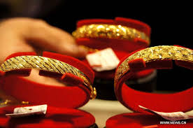 Lo lắng chính phủ Mỹ đóng cửa, vàng tăng nhẹ nhờ lực mua an toàn