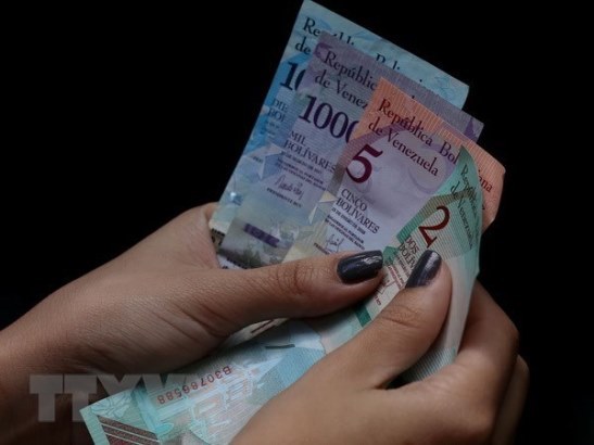 Venezuela loại đồng USD khỏi thị trường hối đoái