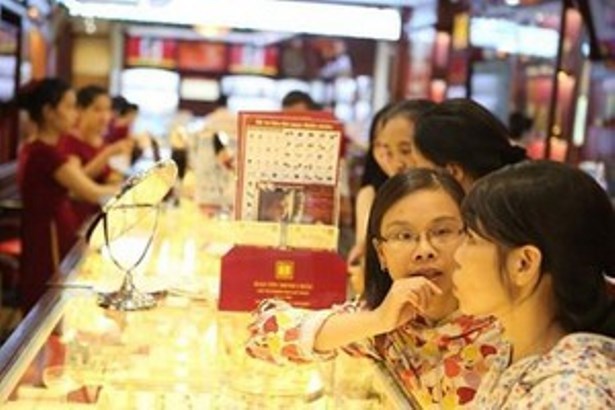 Vàng hạ nhiệt sau nhiều ngày tăng mạnh